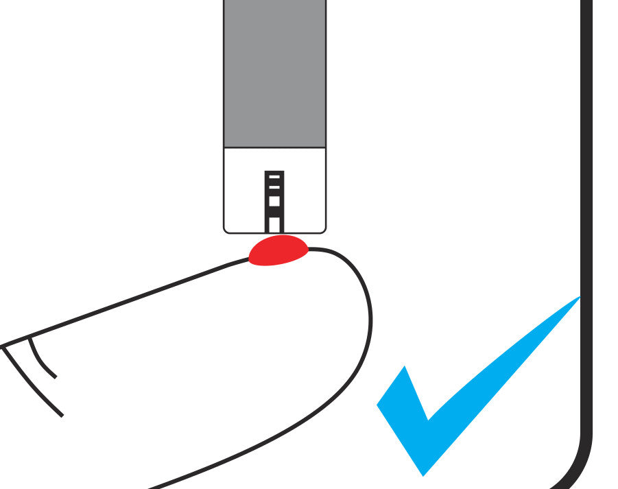 The strip tip drawing blood from a fingertip droplet